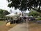 People explore booths that line pathway at Earth Day Celebration