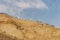 People extreme lowering from high mountain in beautiful nature desert in dry judean picturesque