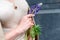 People, fashion, jewelry and luxury concept, closeup of woman wearing luxury jewelry standing on the street. Color