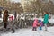 People feed the pigeons in winter