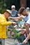 People feeding Native Australian Rainbow Lorikeet in Queensland Australia