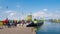 People and ferry leaving Tiengemeten island in Haringvliet estuary, Netherlands
