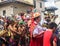 People Fill the Streets in Colorful Costumes during the Pase Del Nino Parade in Cuenca Ecuador