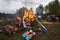 People firing the paper symbols for dead people after burial