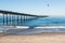 People Fish and Enjoy View From Ocean Beach Fishing Pier