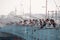 People fish from the Galata bridge, Istanbul