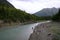 People fishing along the banks of the river Alaska.