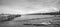 People fishing at the end of a dock in Springtime. Nova Scotia coastline in June.