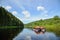 People float down the River on inflatable catamaran