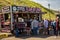 People forming an orderly queue at Starvin Marvinâ€™s mobile fish and chip van on Cromer sea front. With the chip shops in the