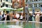 People and fountain at Munsterhof square Zurich