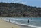 People Frolic in the Surf at Torrance Beach on a Sunny Afternoon in the South Bay of Los Angeles County, California