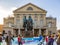 People in front of Goethe and SChiller monument enjoy ice skating