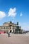 People in front of King Johann horse rider statue, John of Saxony Monument and opera house Semperoper concert hall in Dresden