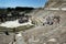 People gather amongst the Roman theatre ruins at the ancient site of Ephesus in Turkey.