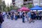 People gather around booths at the Mammoth Food & Wine Experience summer festival to