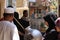 People gather infront of foul traditional Egyptian food