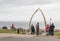 People gathering at Whitby Whale Bones landmark