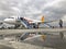 People getting off the Pegasus Airlines plane on the airport of Denizli in Turkey