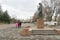 People go to the Alesha monument to soldiers of the WWII on the background of the Victory Memorial in the Krasnoyarsk city.