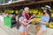 People Group Buying Bananas On Street Traditional Market, Young Woman Travelers