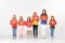 People. Group of children with red banners isolated in white