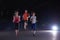 People group jogging at night