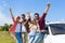 People group outdoor countryside excited raise arms friends smile