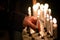 People handling candles in the hands. Christmas and lucia holidays in Sweden