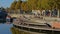 People hanging out on a quay along river Lys in Portus Ganda, Ghent