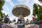 People have fun at the carousel flying swing ride attraction at Tibidabo Amusement Park