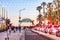 people have fun entering the pier to the amusement area pacific park on the pier of Santa Monica by night