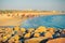 People have a rest on ocean shore in Somnath