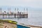 People having breakfast in a restaurant on the pier or dock over the sea in Urla, Izmir, Turkey