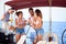 People having fun drinking and laughing together - Youth lifestyle and vacation concept