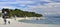 People are having fun on the main beach at Baska Voda town. The Makarska riviera in Croatia is famous for its beautiful pebbly bea