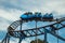 People having fun on a roller coaster