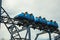 People having fun on a roller coaster