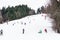 People Having Fun Skiing On Snowy Mountain