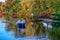 People having a rest in nature on Konka River in Kherson plavny on a sunny summer evening. Woman