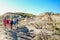 People hiking amidst the landscapes in Alberta`s Dinosaur Provincial Park