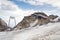 People hiking around Dachstein Hunerkogel mountain station, Alps, Austria