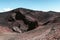 People hiking on Mountain Etna volcano in Sicily, Italy. The biggest active volcano in Europe