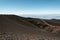 People hiking on Mountain Etna volcano in Sicily, Italy. The biggest active volcano in Europe