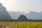 People hiking and riding bike outside Vang Vieng