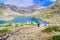 People hiking to Estany Primer in Tristaina, Andorra