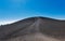 People hiking to the top of Inferno Cone at Craters of the Moon National Park