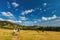 People hiking towards the famous Flatirons