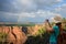 People on hiking trip taking pictures of beautiful landscape.