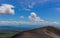 People hiking through volcano